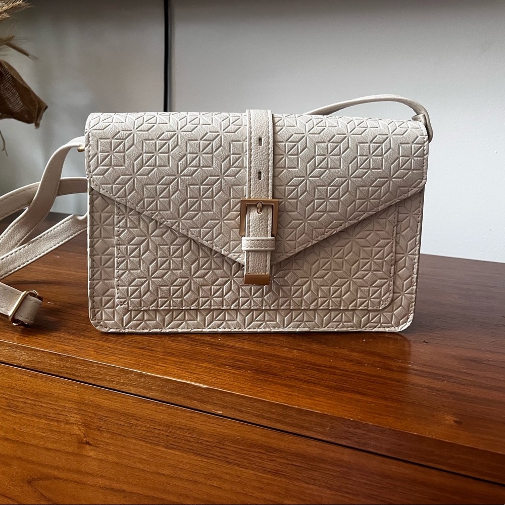 Cream color crossbody purse